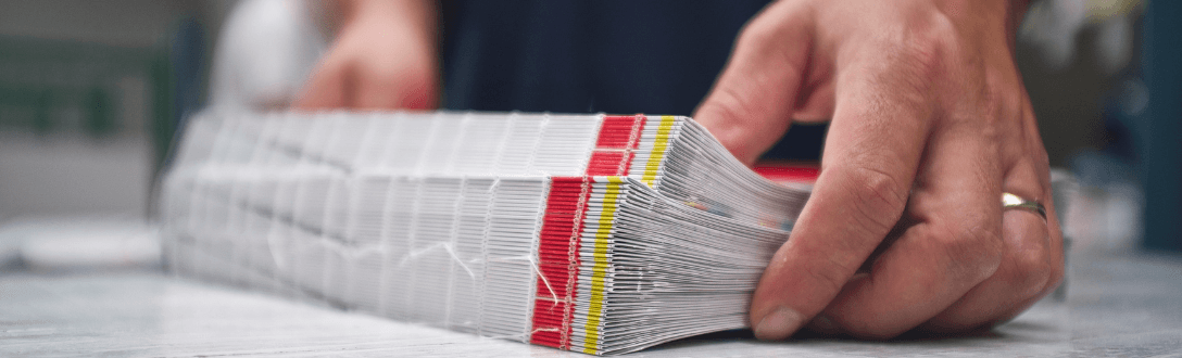CNAE 1822-9/01 – Serviços de encadernação e plastificação: pode ser MEI? quanto paga e quando desenquadrar do MEI