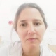 María E Büechele
