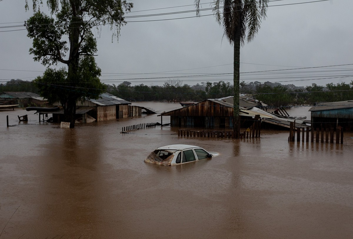 Enchente de um ano atrás na cidade gaúcha de Eldorado do Sul: ciência como ferramenta contra mudança climática (Foto: Edilson Dantas/O Globo)