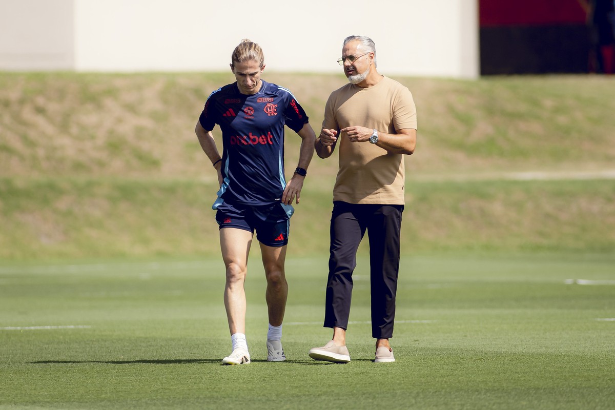 Filipe Luís e José Boto colocam o Brasileirão como prioridade, mas o Flamengo tem débito com a Libertadores (Foto: Adriano Fontes/Flamengo)