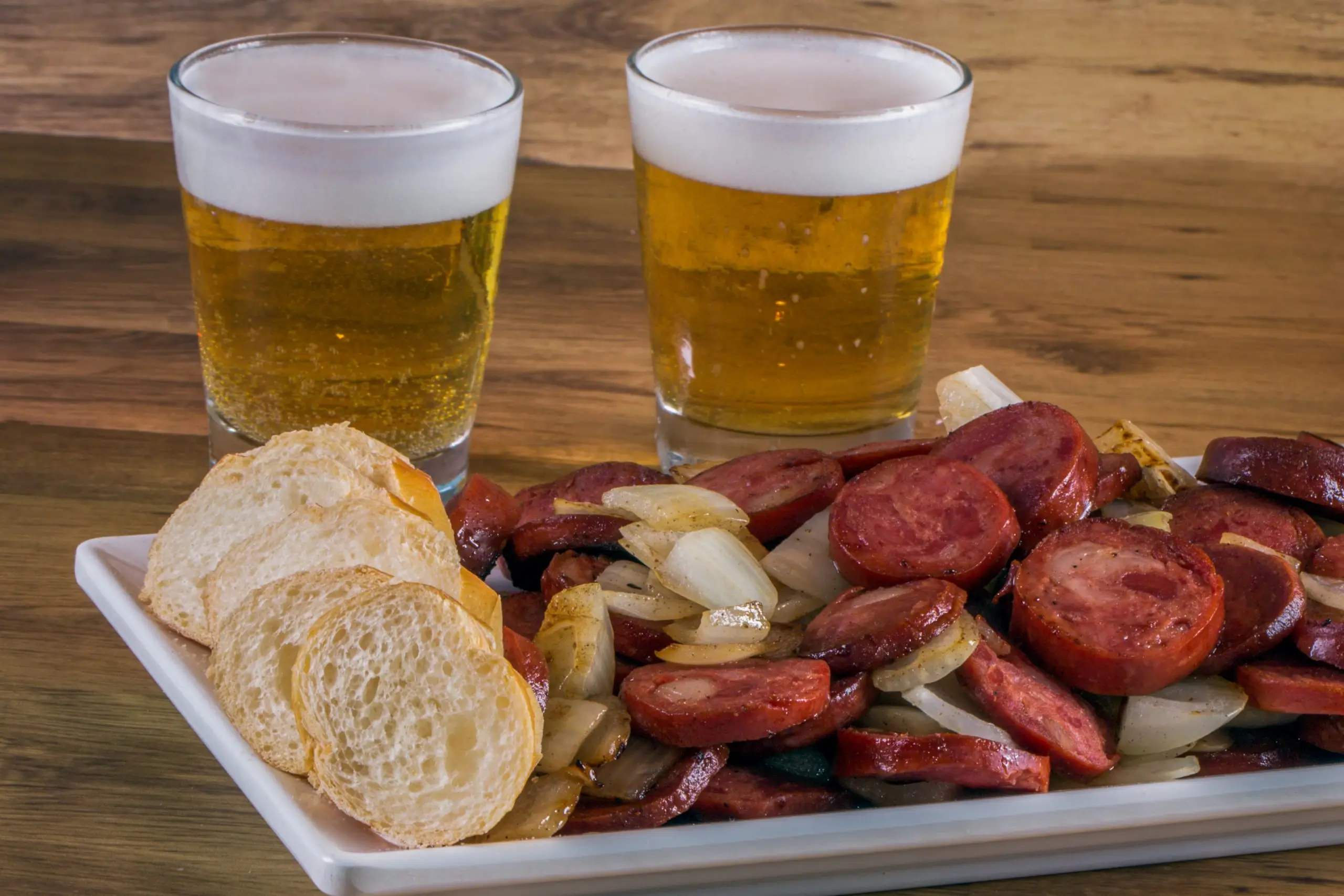 Meia porção de calabresa acebolada