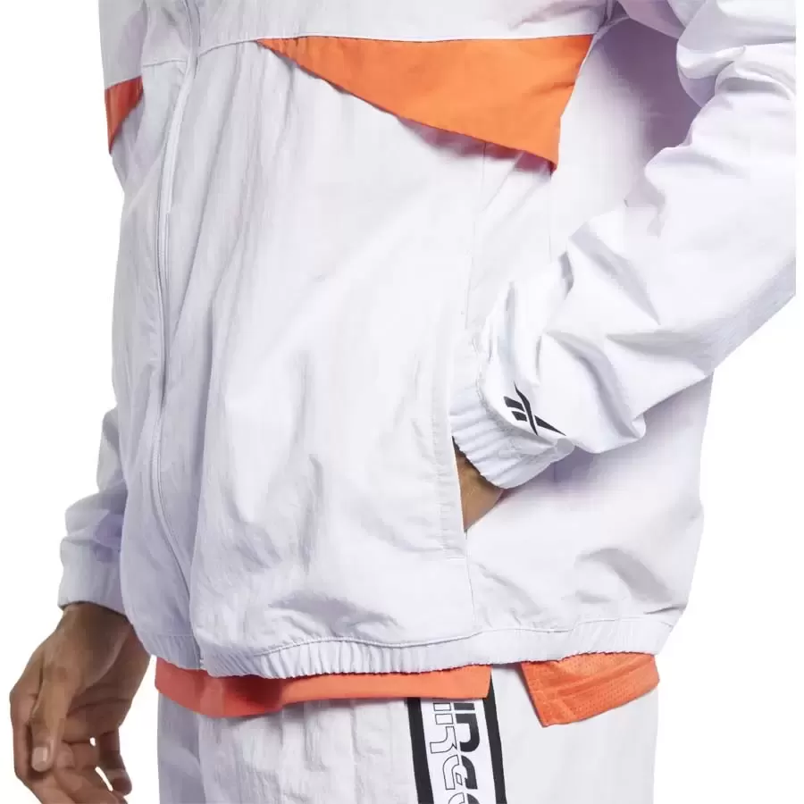 Imagen 2 de 5 de Campera Reebok Meet You There-BLANCO/NARANJA